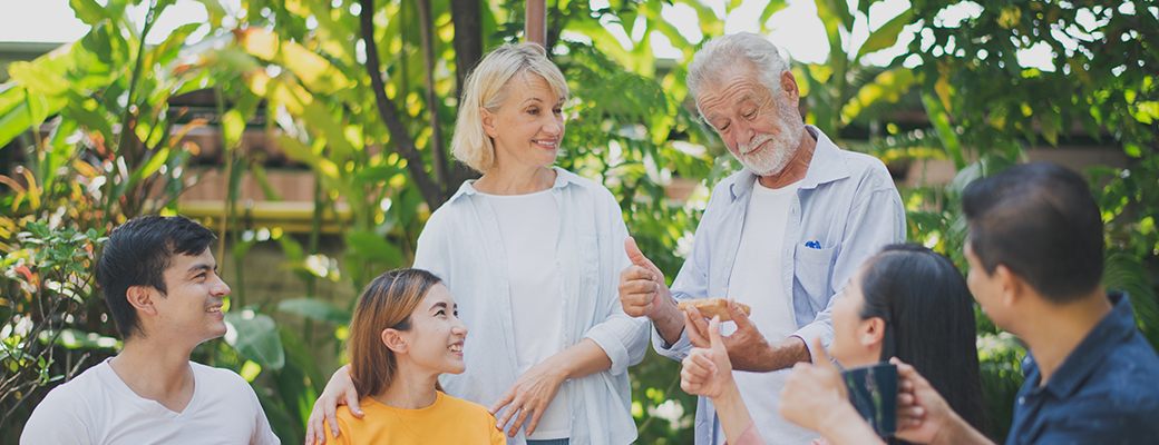 Image of outdoor generational family gathering