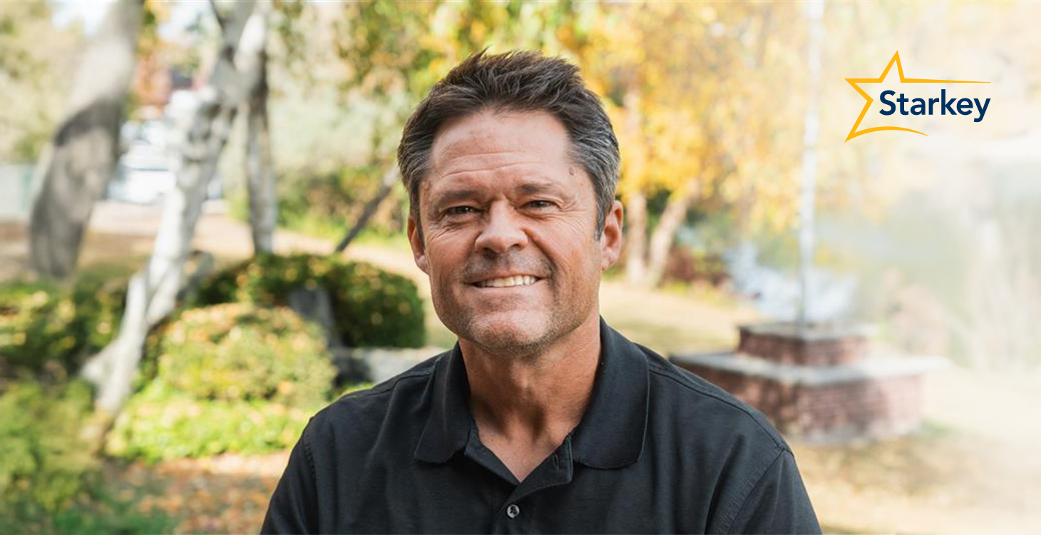 Image of Justin Osmond smiling outdoors