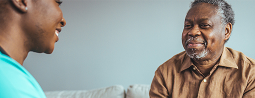 Image of one person counseling another